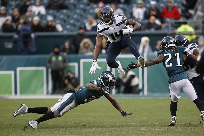 seattle seahawks" dk metcalf (14) leaps past philadelphia eagles