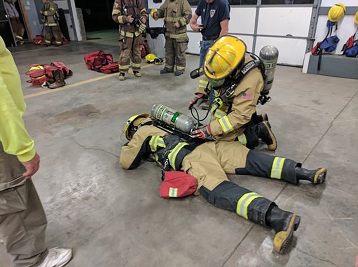 Williams Fire Department firefighters attend a training at a fire station in Williams in July.