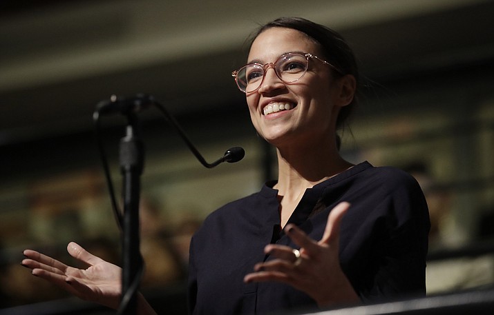 Democrat Alexandria Ocasio-Cortez, who won her bid for a seat in the House of Representatives in New York's 14th Congressional District, at the Kennedy School's Institute of Politics at Harvard University, Thursday, Dec. 6, 2018. (Charles Krupa/AP, file)