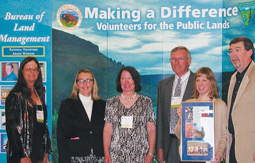 Courtesy Photo<br>
Black Canyon Trail Coalition members accept their award in Washington D.C. From Left; BCTC Vice President Babs Sanders, Arizona State Deputy Director of the Bureau of Land Management Helen Hankins, BCTC President Linda Slay, BCTC Secretary Bob Cothern, BCTC member Sonia Overholser, and BLM National Deputy Director Henri Bisson. 

