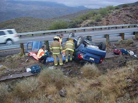 Black Canyon City Fire crews work to extricate a victim from a rollover accident on Interstate 17 during the Thanksgiving holiday.
<i>Courtesy Photo</i>