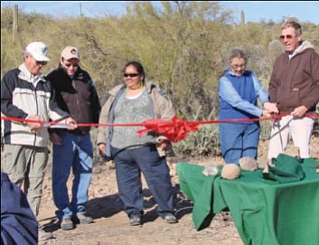 Form left, Bob Cothern, secretary, Black Canyon Trail Coalition; Steve Cohn, BLM HFO manager; Angelia Bulletts, BLM Phoenix District Office Manager; Helen Hankins, BLM Associate State Director, and County Supervisor Tom Thurman cut the ribbon to open the Black Canyon National Recreation Trail.<br>
BBNPhoto/Diana Baker