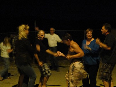 BBNPhoto/Pat Williamson<br /><br /><!-- 1upcrlf2 -->A lively group of dancers enjoys the first Dancing Under the Stars event at the Cordes Lakes Community Center Saturday.