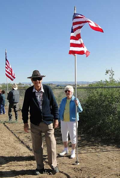 BBNPhoto/Pat Williamson<br /><br /><!-- 1upcrlf2 -->Bob and Alice Eaton were on hand to help raise the flags at Henry Cordes Park for Memorial Day.