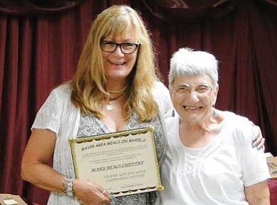 BBNPhoto/Pat Williamson<BR>
Mary Beals-Luedtka, director of NACOG’s Area Agency on Aging, accepts an award of appreciation from MAMOW director Mary Yorgensen for her support of the Meals on Wheels program.