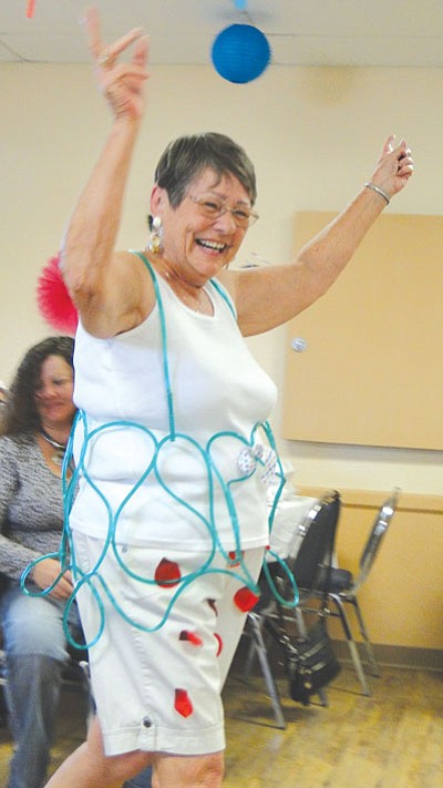 Pat Willamson/BBN<br>
Flo Lottes sports a “tube” top at the Cordes Lakes Ladies Luncheon April 10.
