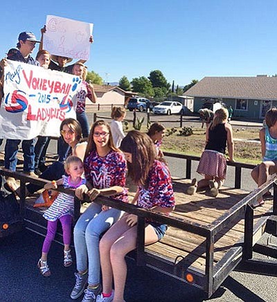 Members of the Mayer High School girls volleyball team ride in the Cordes Lakes Community Days Parade on Saturday, Sept. 19. There were 27 entries this year, which nearly doubles the previous record of entries (14).