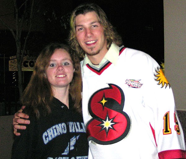 Courtesy photo/Tammy Imperia<br>
Chino Valley High School student, Ashley Imperia, poses for a photo with Sundogs’ player, Chris Greene, after she interviewed him in October, before the team traded him to the Wichita Thunder.