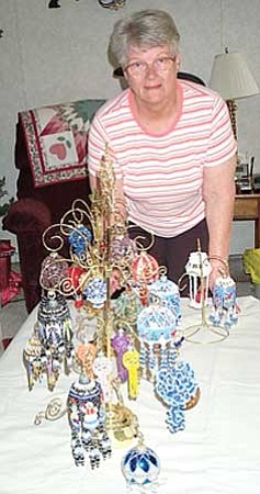 Review/Diane DeHamer<br /><br /><!-- 1upcrlf2 -->Chino Valley resident Glenda Block shows a few of her handmade beaded Christmas ornaments.