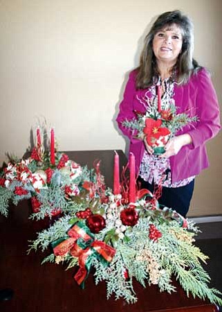 Review/Salina Sialega<br /><br /><!-- 1upcrlf2 -->Linda Thomas and women at her church, Paulden Christian Fellowship, make and sell Christmas floral arrangements like these.