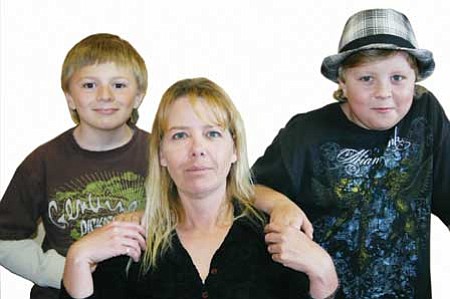 Mom Sara Morgan and her twin sons, Cameron and <br /><br /><!-- 1upcrlf2 -->Aaron, age 9.