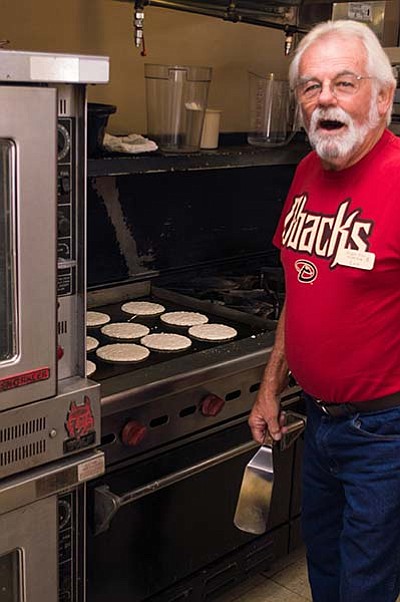 Lee Dudley cooks up a fresh batch of pancakes for the 2018 Territorial Days Pancake Breakfast at the Chino Valley Senior Center. The 2021 breakfast is Sept. 4. (Review file)
