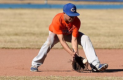Chino Valley High School’s Andrew Granillo fields a ground ball during preseason workouts on Wednesday, Feb. 17 at the school. (Matt Hinshaw/PNI)
