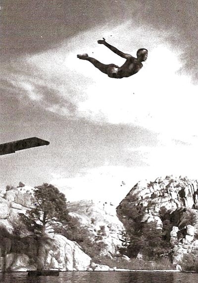 Courtesy photo<br>A 16-year-old Sherman Payne dives from the platform that was a prominent feature of the Granite Dells Resort. The photo – a part of the Payne family collection – dates back to 1940. Payne, whose family ran the resort for decades throughout the 20th century, died earlier this year at age 86.
