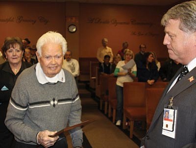 Courtesy photo/City of Prescott<br>World War II 
veteran John Cornelius, left, receives an award from VA Health Care System Associate Director James Belmont Jr., for raising more than $100,000 for improving the lives of disabled veterans.