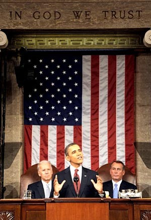 Saul Loeb/The Associated Press<br>
President Barack Obama delivers his State of the Union address on Capitol Hill Tuesday as Vice President Joe Biden and House Speaker John Boehner listen. 

