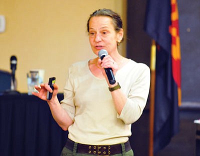 Les Stukenberg/The Daily Courier<br>LTC (Ret.) Cynthia Rasmussen speaks at the MATForce Homecoming from Warrior to Citizen conference Monday at the Prescott Resort.