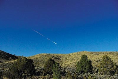 Lisa Warren, NASA/JPL/The Associated Press<br>
This image provided by NASA’s Jet Propulsion Laboratory shows a meteor over Reno Nevada Sunday. The former space-rock-turned-flaming-meteor entered Earth’s atmosphere around 8 a.m. PDT. 
