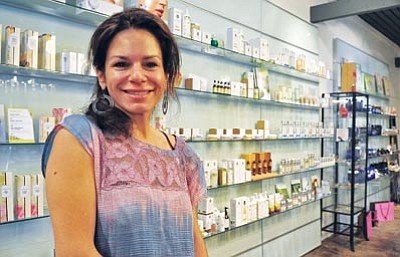 Matt Hinshaw/The Daily Courier<br>
Elisabeth Dinerman, owner of DeLovely Cosmetic Apothecary on Granite Street, opened her business in 2004.

