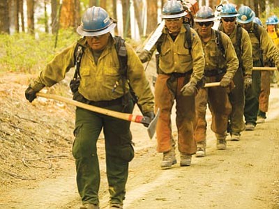 Kari Greer,United States Forest Service/Courtesy photo<br>
Firefighters head to the Gladiator fireline May 20.



