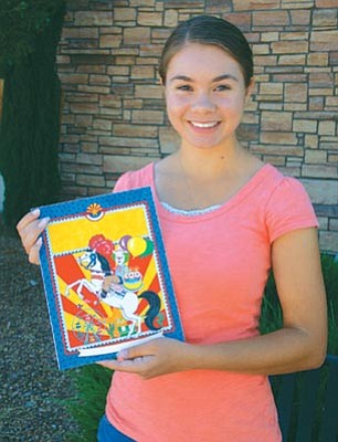 Lisa Irish/The Daily Courier<br>
Shalom Eis, 16, of Dewey, shows off her drawing that will appear on the cover of the Yavapai County Fair 2012 Premium Book.
