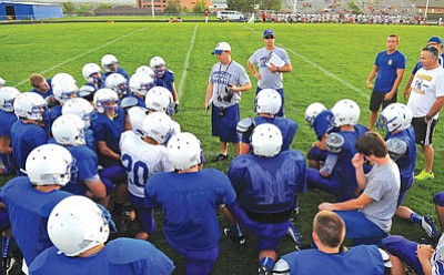 Matt Hinshaw/The Daily Courier<br>Prescott High School head coach Cody Collett talks with his team Wednesday evening at Prescott High School during a preseason scrimmage against Red Mesa and Coconino.