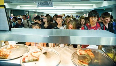 Les Stukenberg/The Daily Courier<br>
Students in the first lunch at Prescott High School line up to get their food and fill up the approximately 400 seats inside to eat lunch.