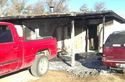 Chino Valley Fire District/Courtesy photo<br>
Chino Valley firefighters put out a fire early Thursday morning in the carport of a home on Bacon Lane.