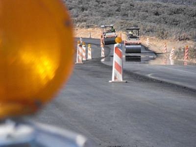 Scott Orr/The Daily Courier<br /><br /><!-- 1upcrlf2 -->Crews work on the Iron Springs Road project. The $7.2 million effort will widen the road a bit, redesign some curves, and improve sightlines. <br /><br /><!-- 1upcrlf2 -->