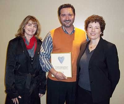 From left, Lori and Barry Barbe, with Northern Arizona AFP Chapter President Chris Adams.