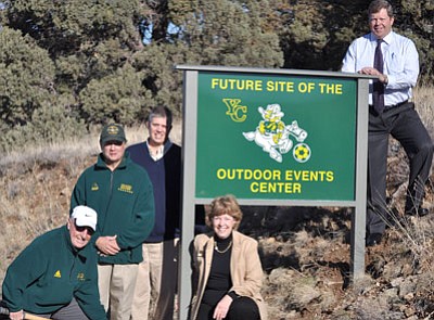 Yavapai College Athletics/Courtesy<br>Clockwise from left, Associate Soccer Coach Hugh Bell, Head Soccer Coach Mike Pantalione, Athletic Director Brad Clifford, Dean of Health and Sciences Scott Farnsworth and YC President Dr. Penelope Wills erected a sign Thursday promoting the future site of the proposed campus events center.