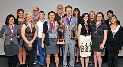 Matt Hinshaw/The Daily Courier<br /><br /><!-- 1upcrlf2 -->The Prescott High School Academic Decathlon Team won 36 medals and trophies in a regional competition, finishing in third place overall. The team is coached by PHS teacher Derk Janssen.