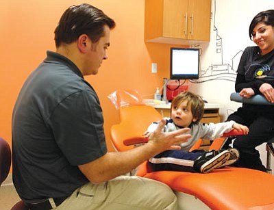 Courtesy photo<br>Gabriel Lopez visits Dr. Raber of Every Kid’s Dentist for the first time.
