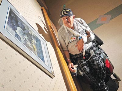 Matt Hinshaw/The Daily Courier<br>World War II Navy veteran Harry Smeltzer Jr. served on the USS Franklin’s catapult crew in the Pacific Ocean, 
surviving three attacks.