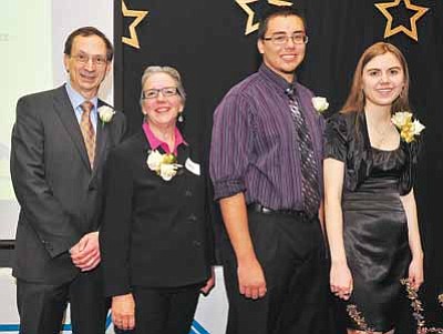 Matt Hinshaw/The Daily Courier<br>
From left, Prescott Area Leadership Man of the Year recipient Dr. David Hess, Woman of the Year Gerry Garvey, and Youths of the Year Blake Krofchik and Emily Moore, gather together after being recognized Wednesday night at the Prescott Resort.
