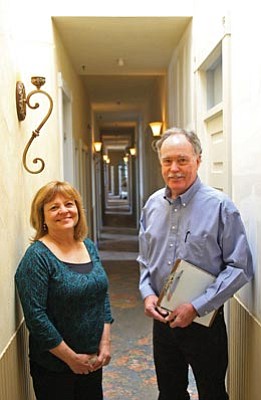 Matt Hinshaw/The Daily Courier<br>Owner Nancy Hinson and architect Bill Otwell pose in the main hall of the Grand Highland Hotel in Prescott Thursday.
