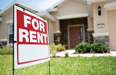 Photos.com<br>For-rent signs are common in the quad-city area. Property managers here deal with a variety of tasks, including showing rentals, collecting rent, enforcing the rules and evicting tenants.