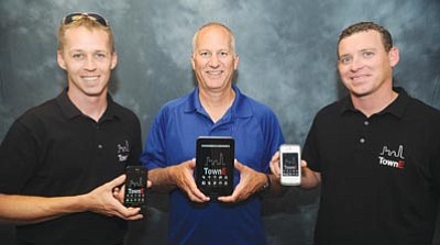 Les Stukenberg/The Daily Courier<br>James Daye, Brent Lonius and Richard Kaluhiokalani developed a new mobile app called TownE that offers deals from local businesses.