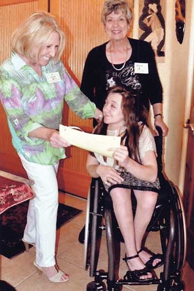 The P.E.O. STAR Scholarship for the 2013-2014 academic year was presented by Freddi Dahn and Grace Hicks of P.E.O. Chapter 0 Prescott to Sarah Cramer, a senior at Tri-City College Prep High School.