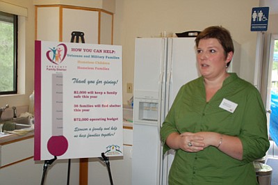 Lisa Irish/The Daily Courier<br>
After giving a tour of Prescott Area Shelter Services new family shelter Maggie Garvey talked with visitors about how $72,000 in donations would provide shelter for 36 families over the next year.)
