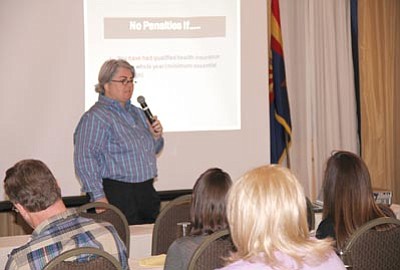 Prescott Chamber of Commerce/
Courtesy photo<br>Kathy Steadman, a partner in the Hennelly & Steadman law firm, speaks Wednesday about the Patient Protection and Accountable Care Act.