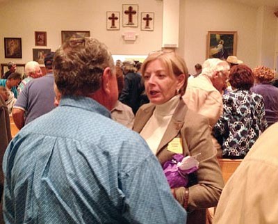 Tamara Sone/The Daily Courier<br>State Rep. Karen Fann, R-Prescott, talks with residents of Yarnell during a town hall meeting on Wednesday.