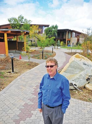 Matt Hinshaw/The Daily Courier<br>Dr. Brian Sajko, Prescott College Dean of Enrollment Management, is spearheading an effort that will lower tuition costs at the school by 11.8 percent beginning in fall 2014.