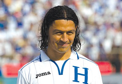 Moises Castillo/The Associated Press<br>Roger Espinoza smiles just prior to Honduras’ World Cup qualifying match against Costa Rica on Oct. 11.