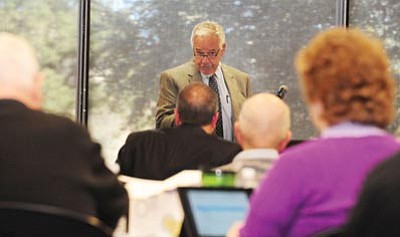 Les Stukenberg/The Daily Courier<br>
Local businessman George Ruffner speaks during an Arizona Town Hall on the state of higher education in Arizona, Monday at Embry-Riddle Aeronautical University in Prescott.
