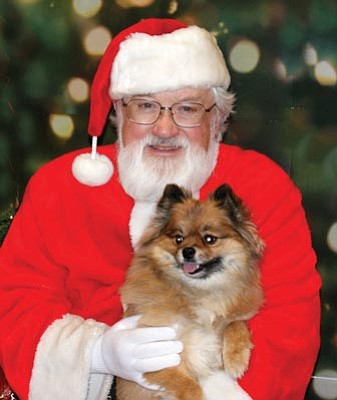 Courtesy photo<br>Holiday photos of Santa and pets will be taken Saturday and Sunday, Dec. 7 and 8, from noon to 3 p.m. at Whiskers Barkery, 225 W. Gurley St., Prescott.