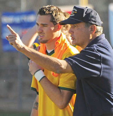Matt Hinshaw/The Daily Courier<br>Mike Pantalione coaches Avery Hardie-Jordan back on Nov. 9, 2013, at Ken Lindley Field during the West District Championship against Otero College.  The win over Otero was Pantalione’s 535th, which set the all-time NJCAA career coaching milestone.