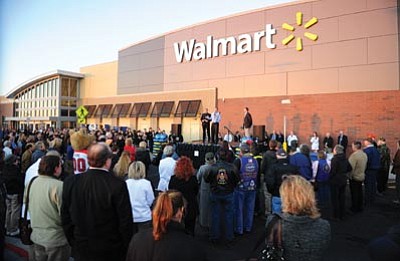 Les Stukenberg/The Daily Courier<br>Walmart executives welcome shoppers at the new Walmart opening event in Prescott Valley Wednesday morning.