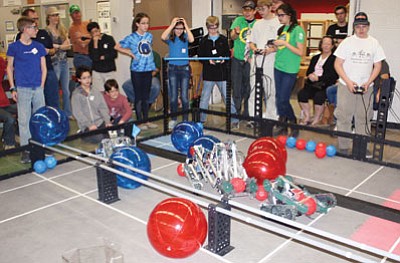 Rachel Saunders/Courtesy photo<br>
Students from Granite Mountain Middle School and Mile High Middle School compete in the state qualifying VEX Robotics competition Feb. 8 in Phoenix. During the competition, students had to navigate their robots through a game involving red and blue balls. Both teams made it to the semi-finals and will compete in the state finals on March 1 in Tempe.
