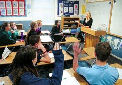 Patrick Whitehurst/The Daily Courier<br>
Seventh and 8th grade math teacher Gwen Jahnke speaks to her students at the Christian Academy of Prescott. Approximately 130 students are currently enrolled at the downtown Prescott private school in preschool through 8th grade.